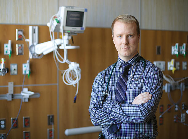 Dr. Jim Maliszewski stands in the hospital where he works