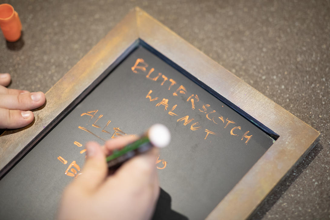 Hand writing on a chalk board