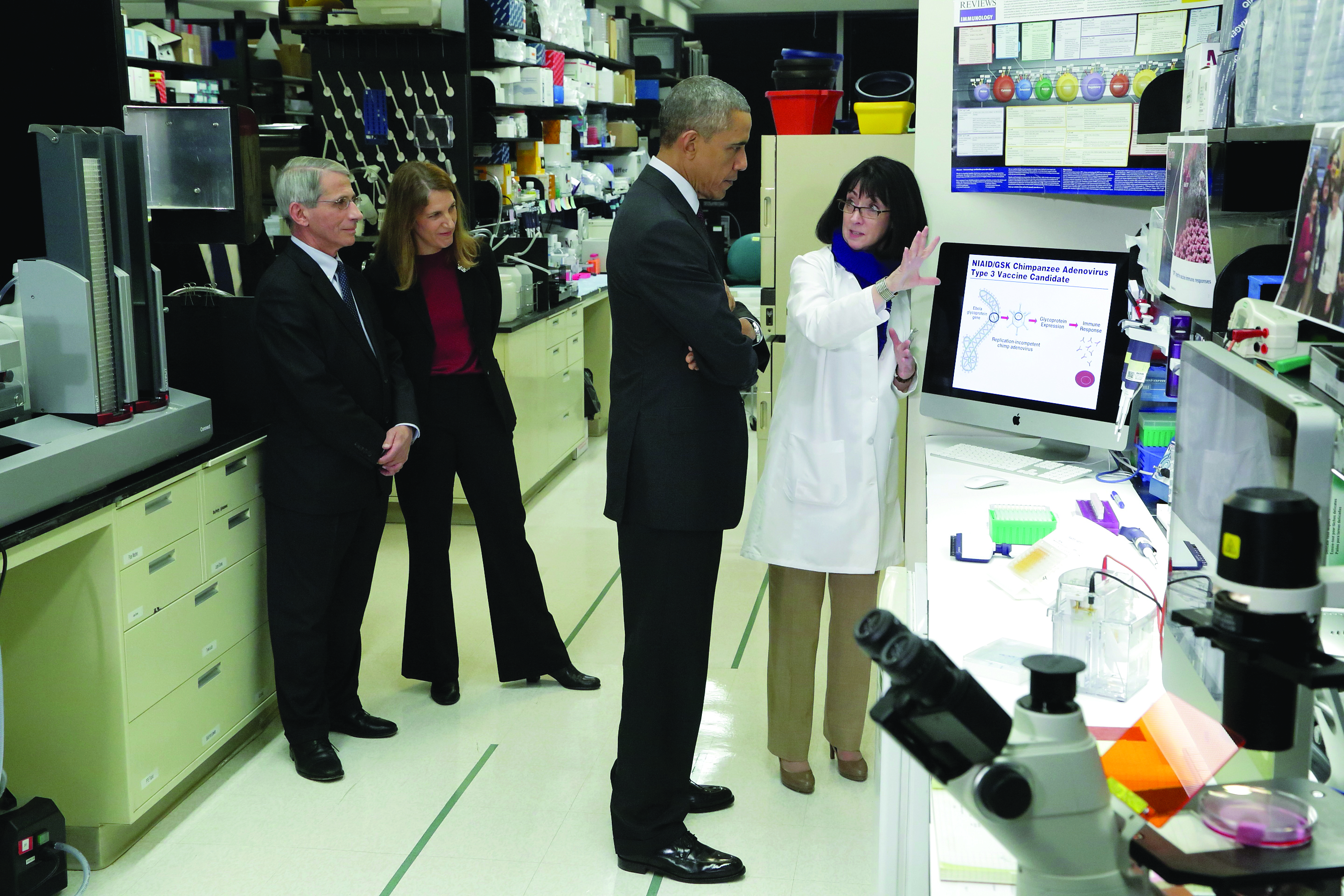 Fauci discussing Ebola research with President Barack Obama as NIAID Director Fauci and Health and Human Services Secretary Sylvia Burwell look on.