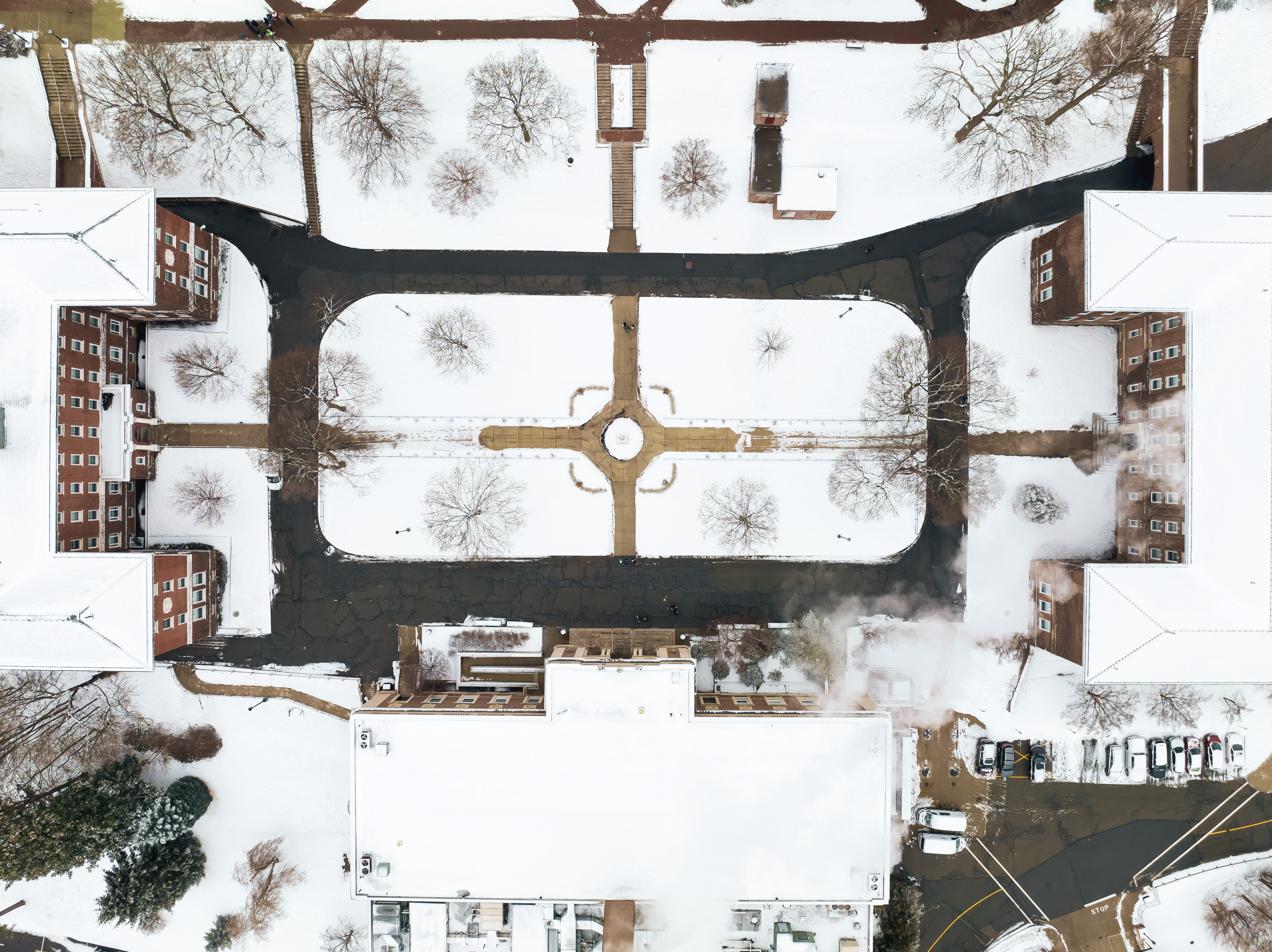 An aerial image of a snow covered college campus