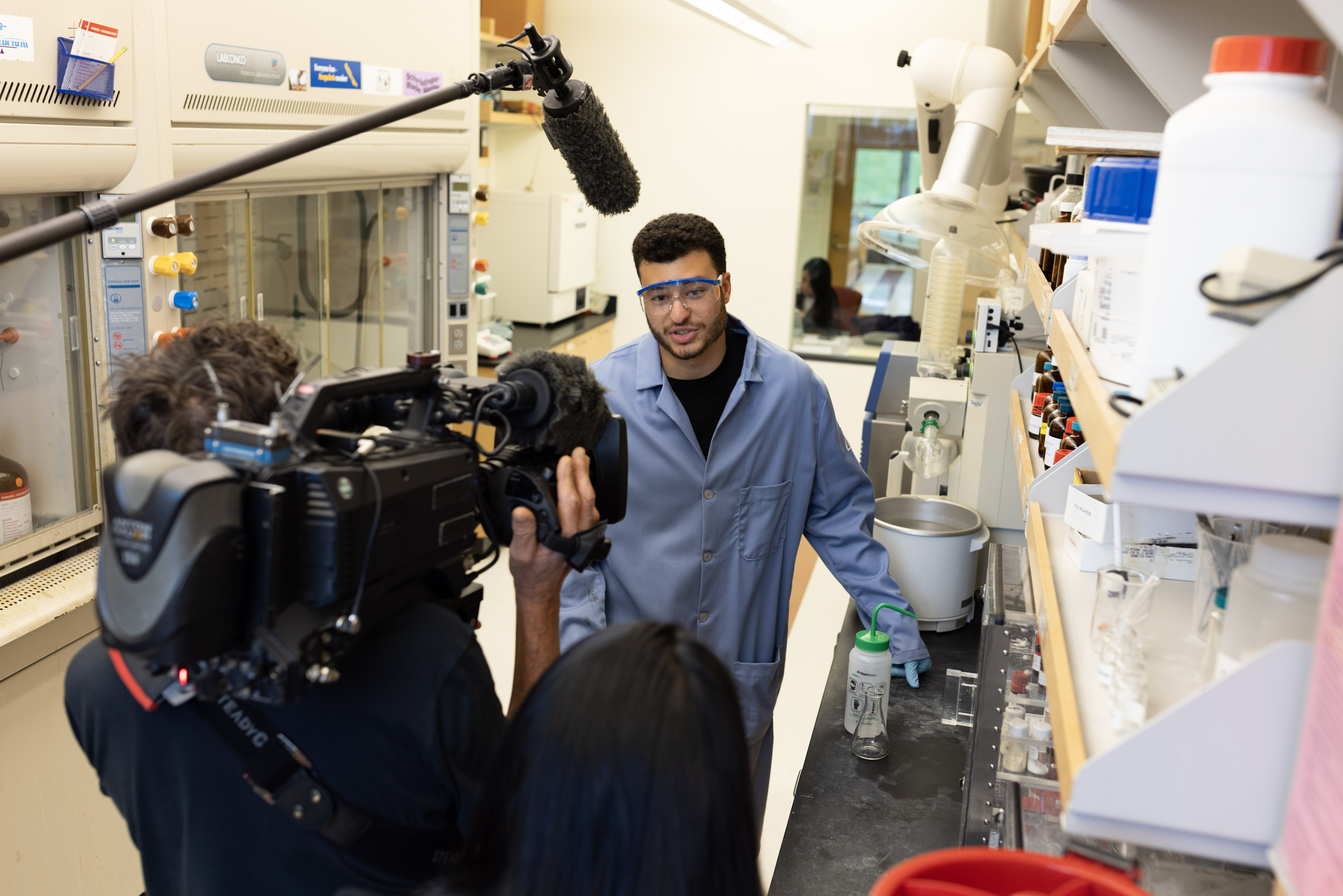 A man being interviewed by a television production crew