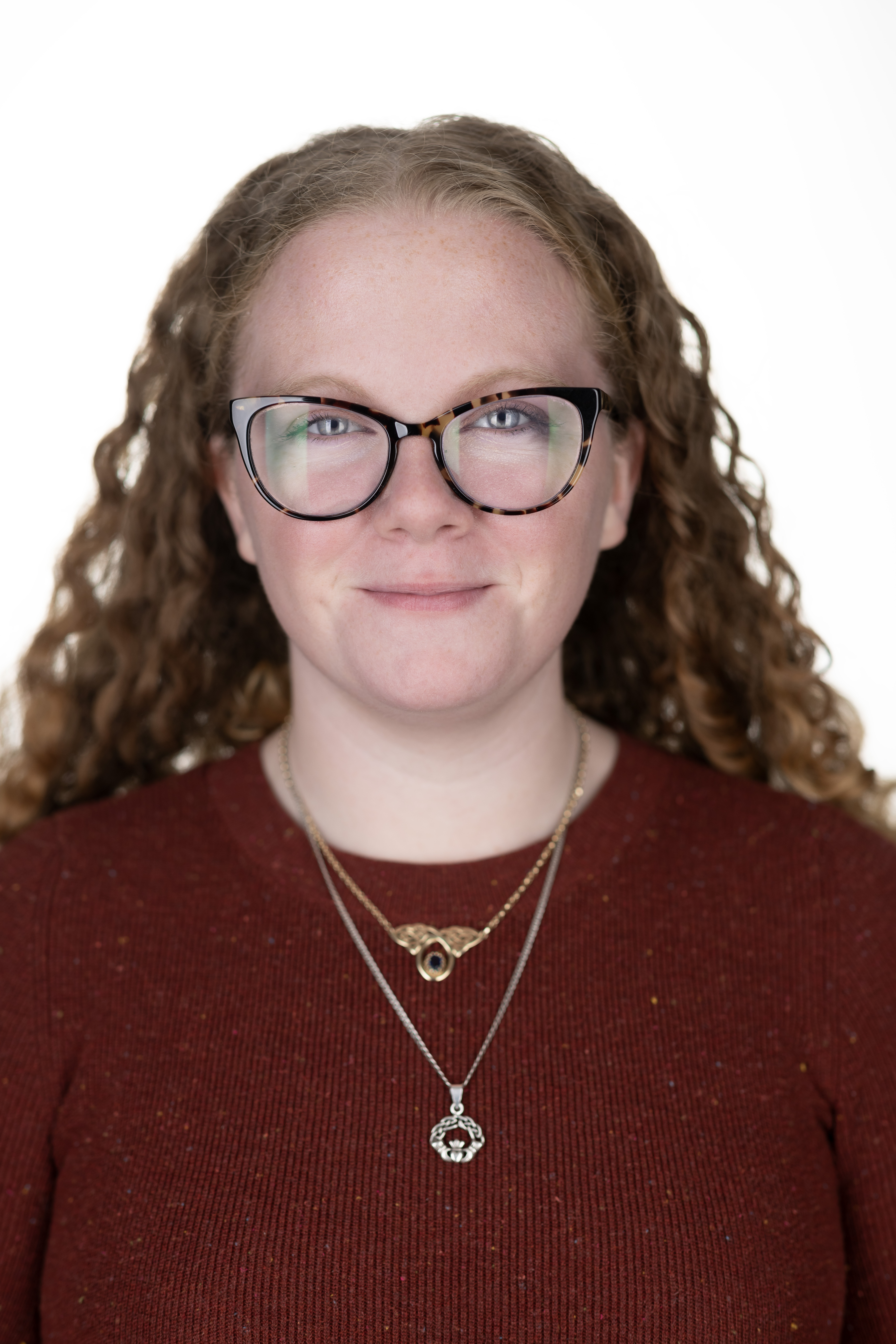 Close up portrait of a woman with a white background