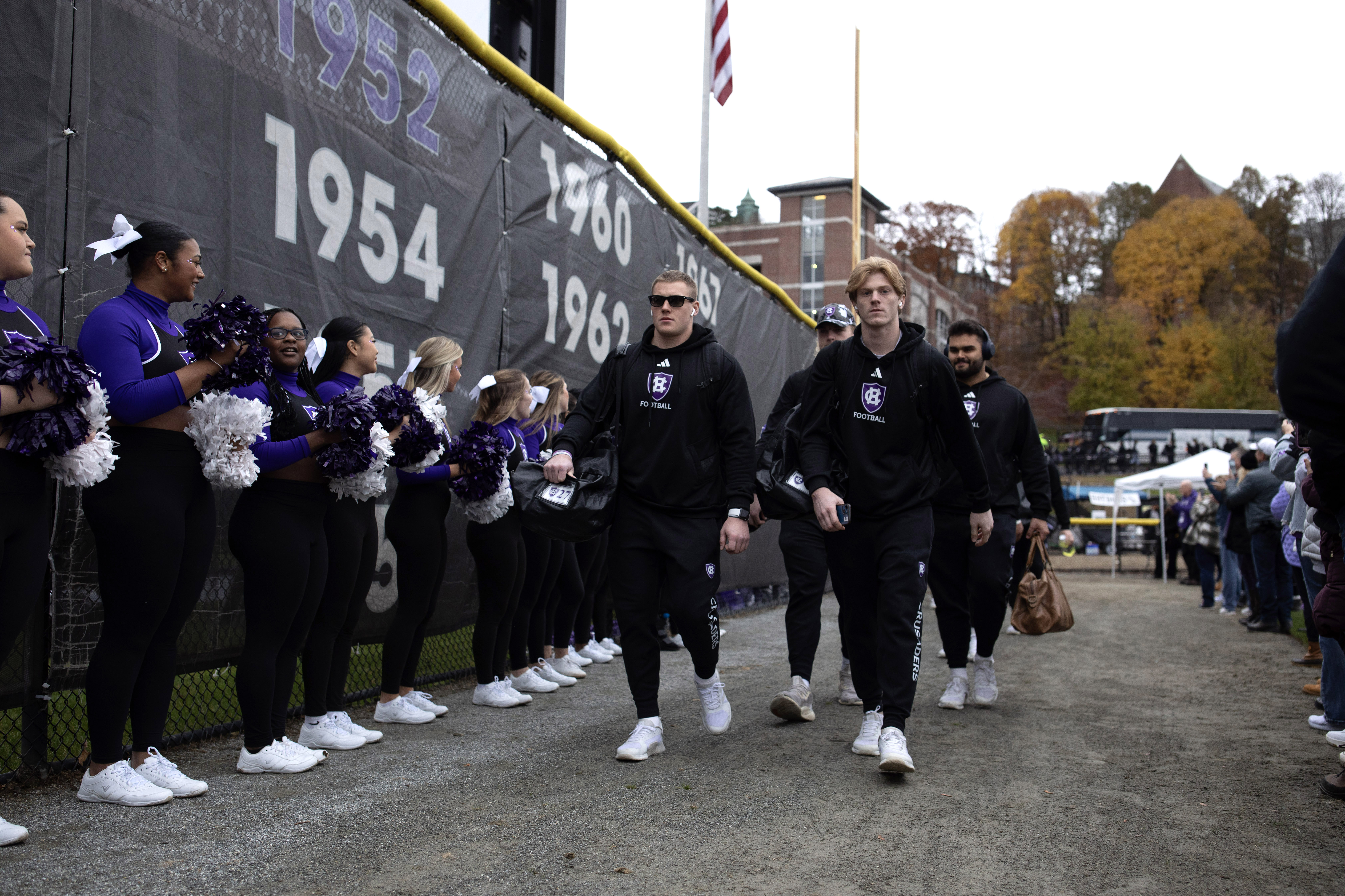 Football players walking towards the locker room