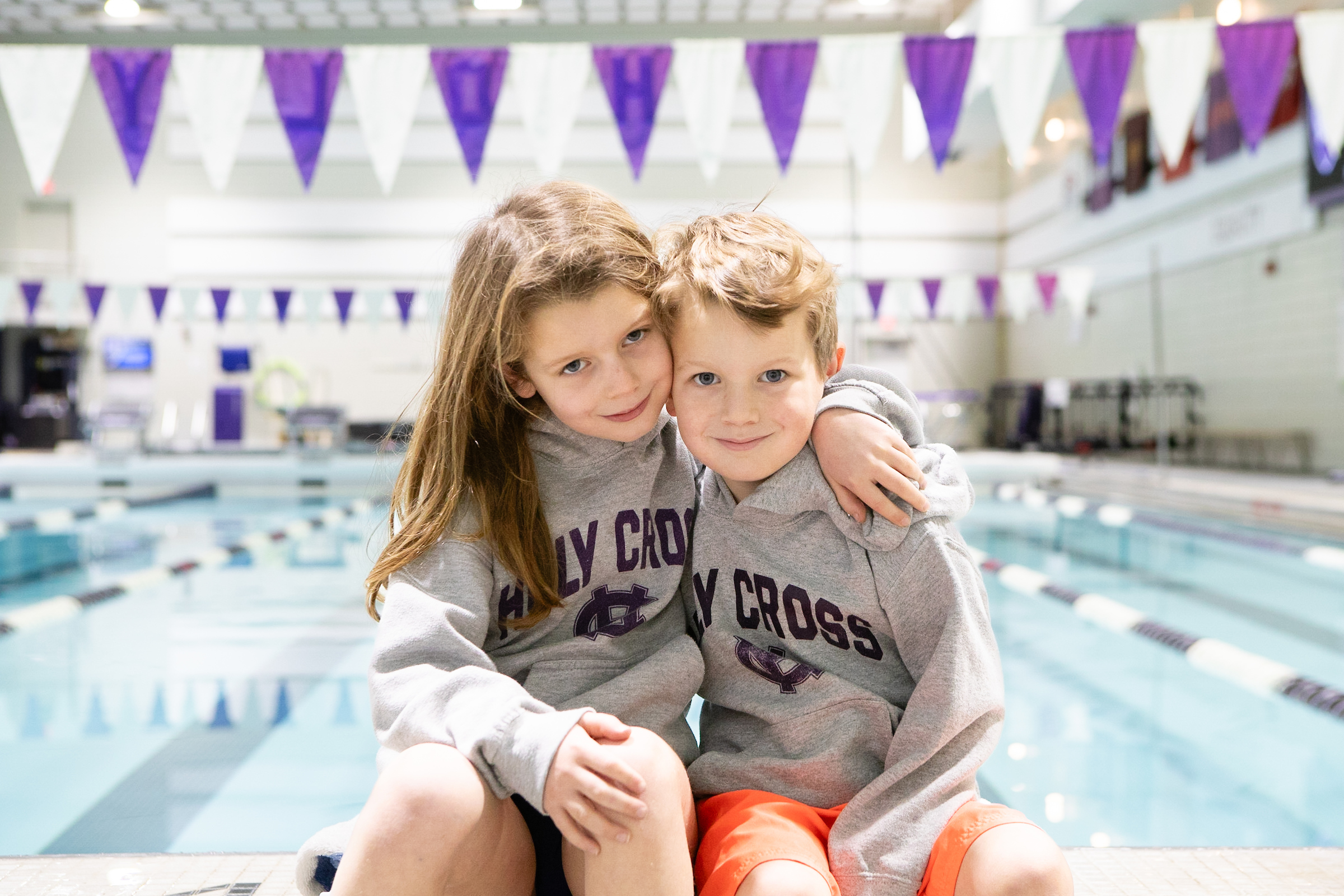 Children of alumni sporting their Holy Cross gear