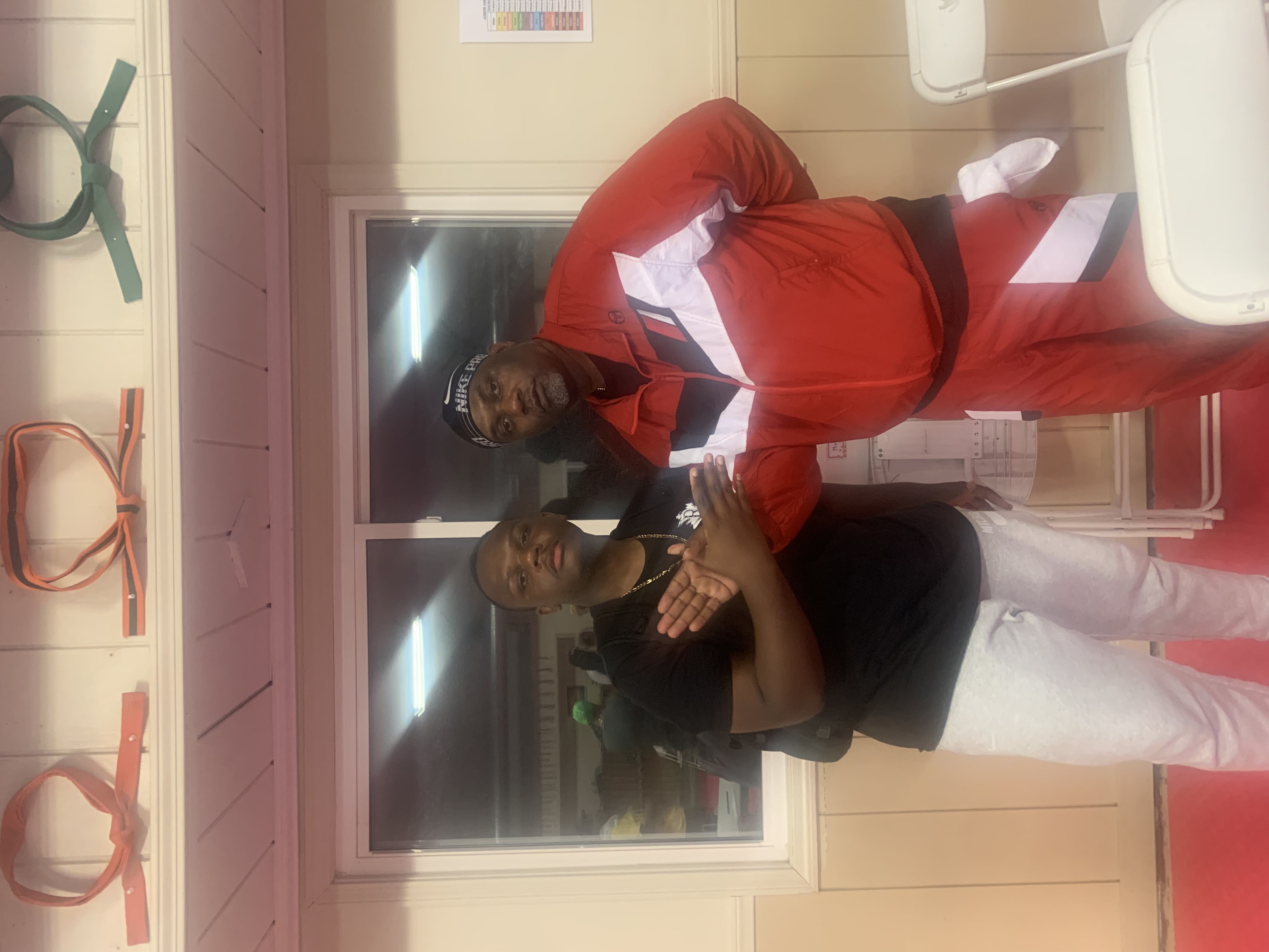 Martell Audate poses with Masta Killa of the Wu-Tang Clan