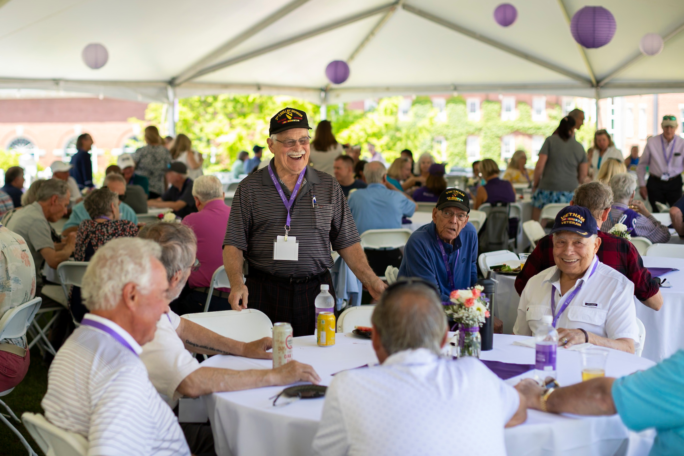 a tent full of Holy Cross alumni
