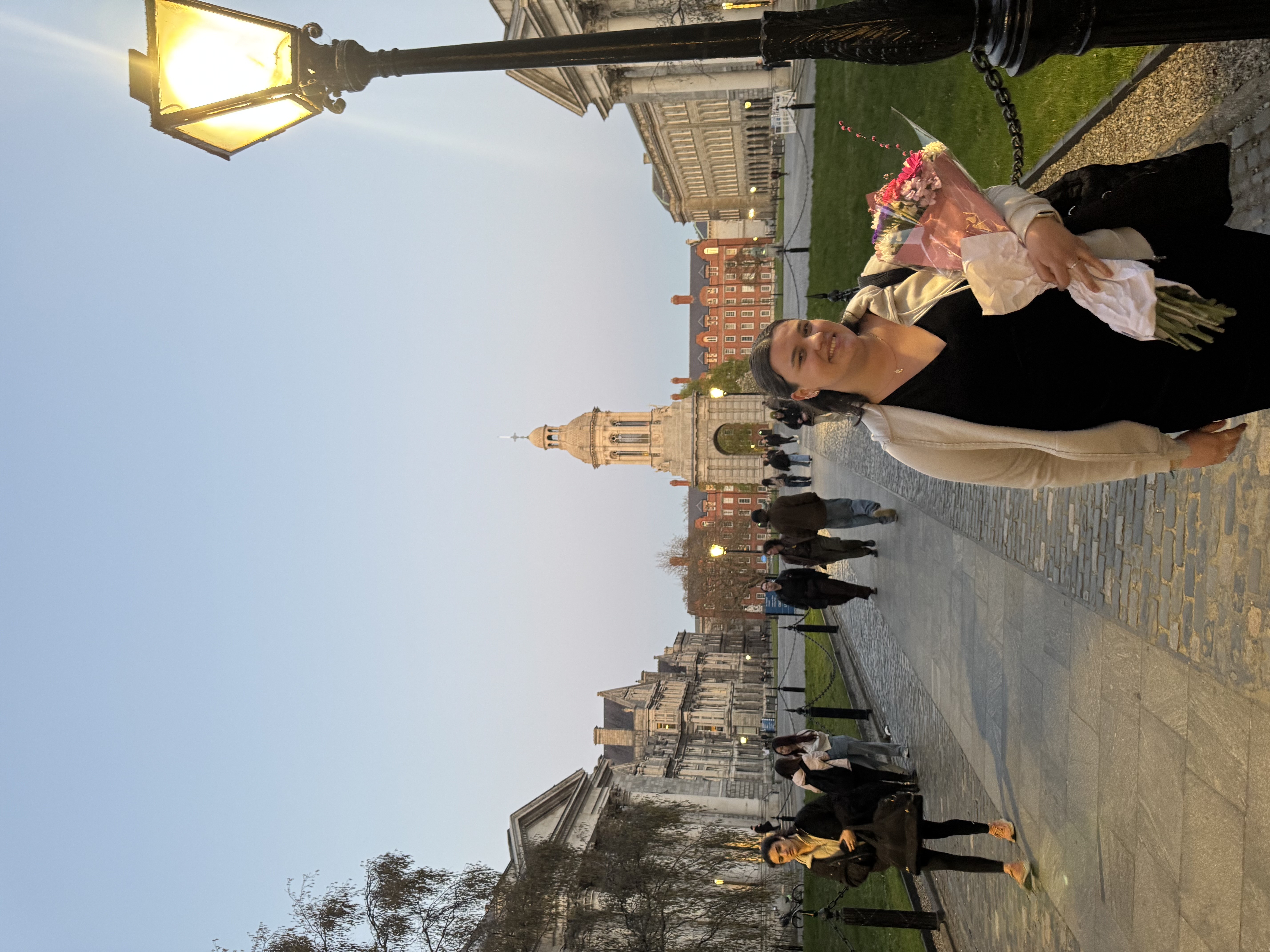 Elaine walking through a square
