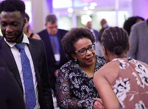 Loretta Lynch greets people following her keynote address
