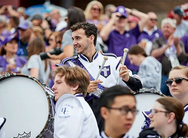 crowds cheer for Holy Cross football