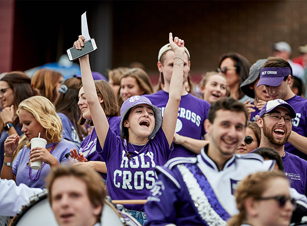 crowds cheer for Holy Cross football