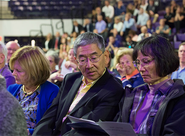 Members of the Holy Cross community listen to the speaking program during the dedication celebrations.
