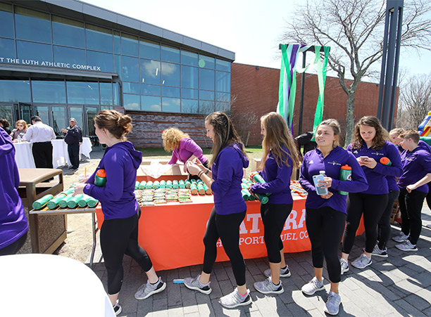 Current student-athletes join in on the celebrations for the dedication of the new athletic complex.