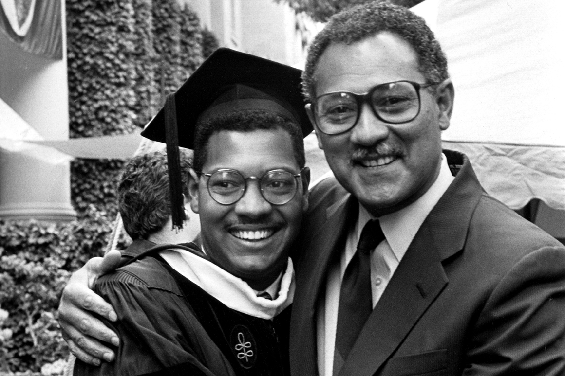 Rougeau at his Harvard Law graduation with his father, a fellow alumnus.