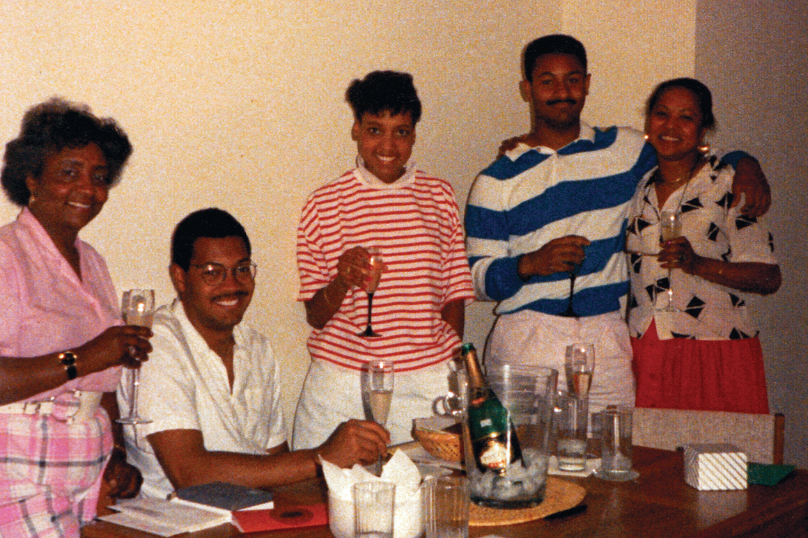 Rougeau and his family are seen here celebrating passing the bar.