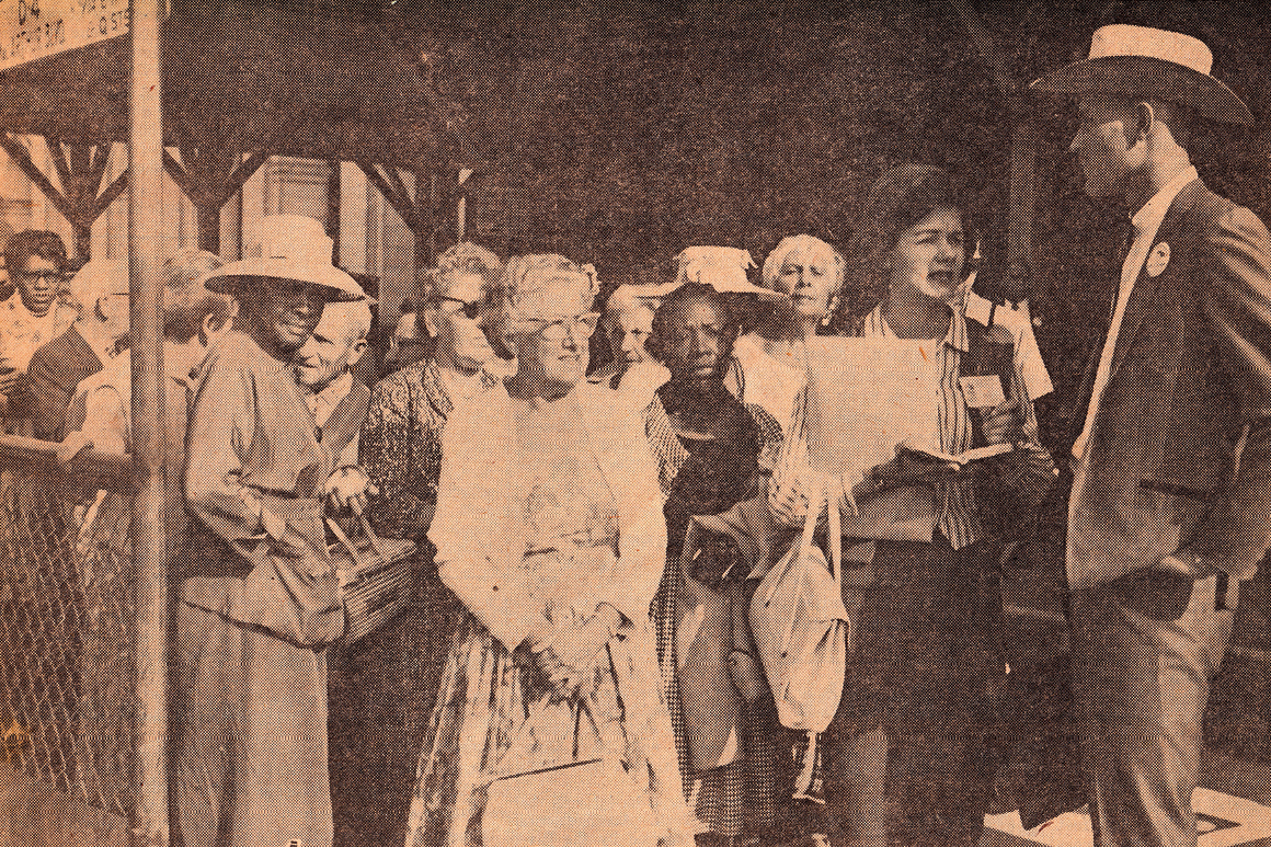 The greater Miami delegation arrives in Washington, D.C., for the 1963 March on Washington. Speaking with delegation leader Weldon Rougeau is Miami Beach Sun staff writer Peg Savage, who covered the historic event for the paper.