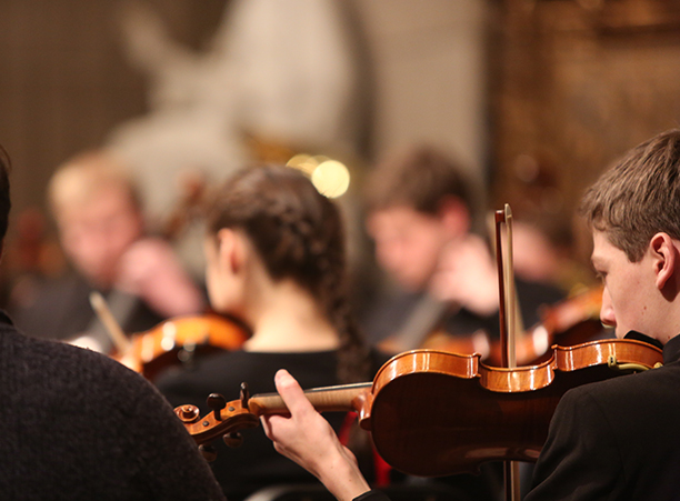 A student violinist performs during Advent Festival of Lessons &amp; Carols.