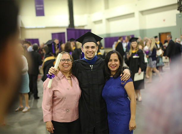 Students celebrate with their friends and family at the reception following commencement.