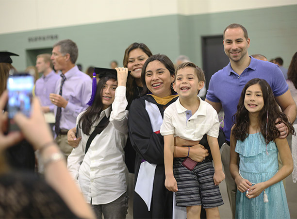 Students celebrate with their friends and family at the reception following commencement.