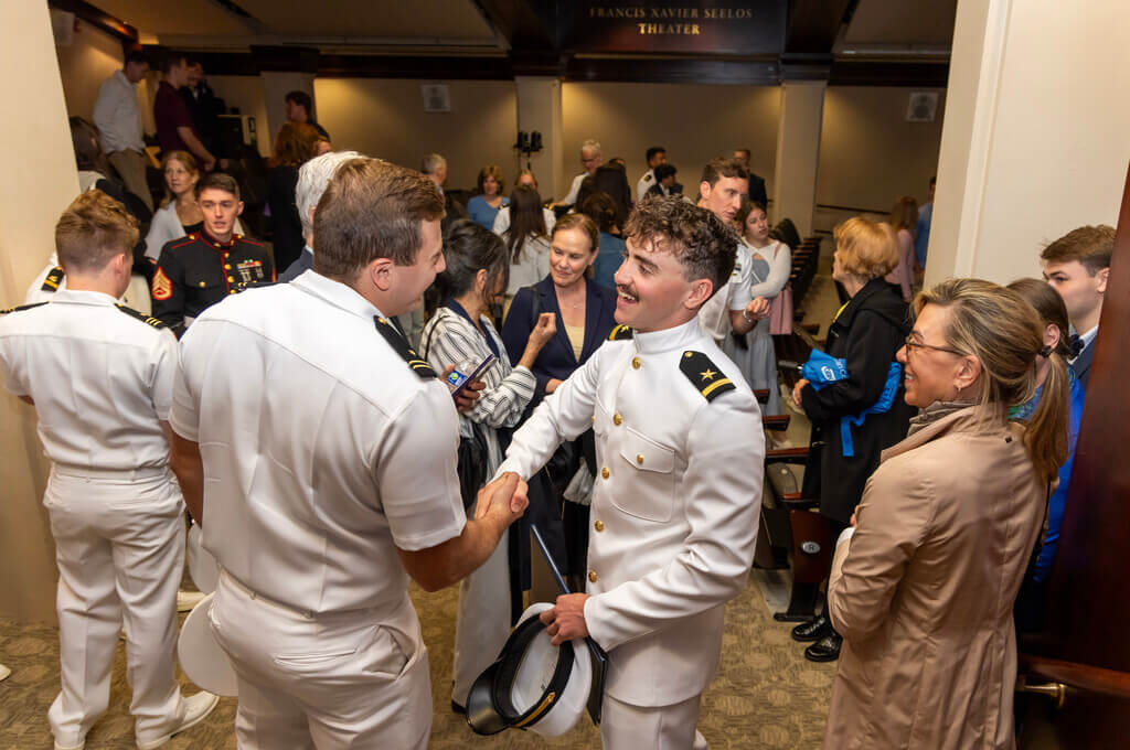 Holy Cross, Worcester Polytechnic Institute, Worcester State and Brown University ROTC students celebrate their 2025 commissions in the United States Navy and the Marine Corps.