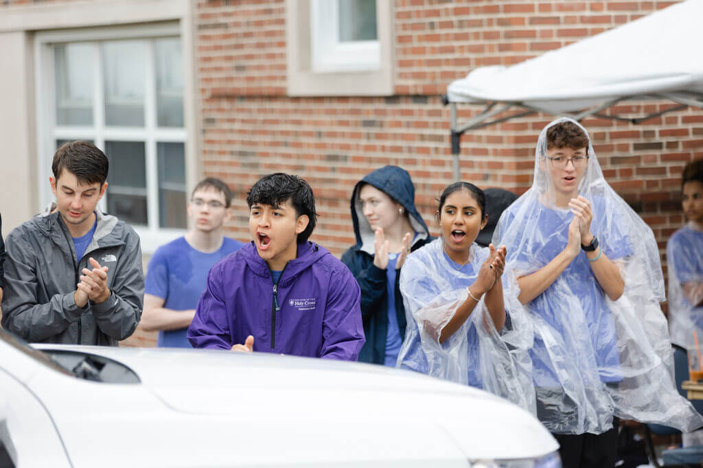 Students cheering in the rain