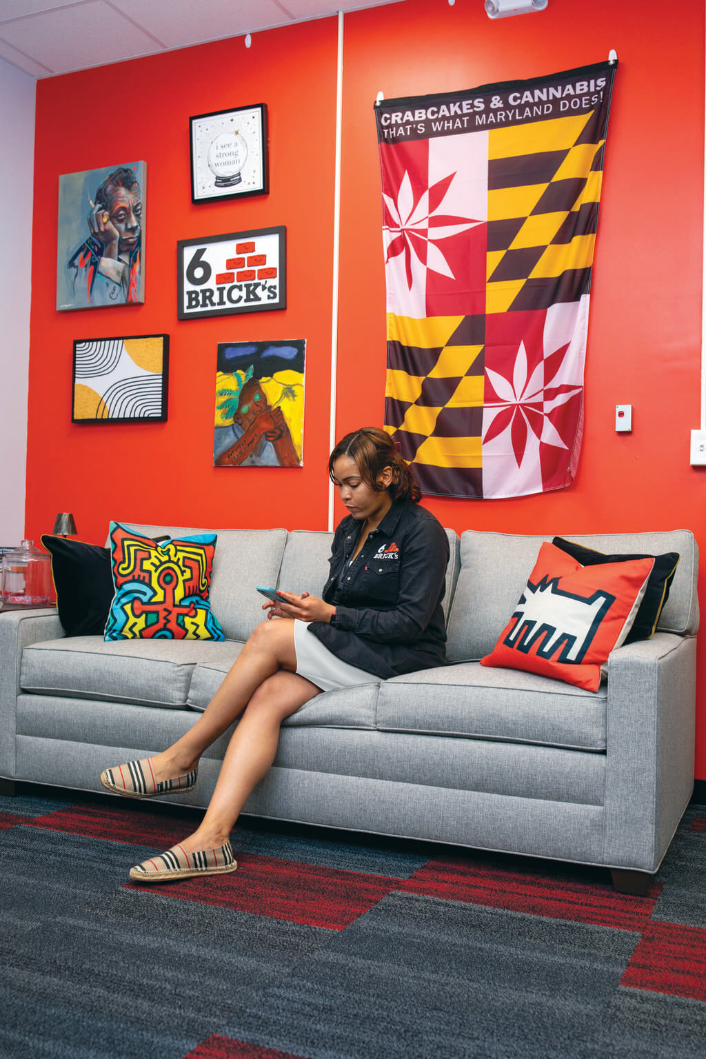 Payton Shubrick sitting on a couch