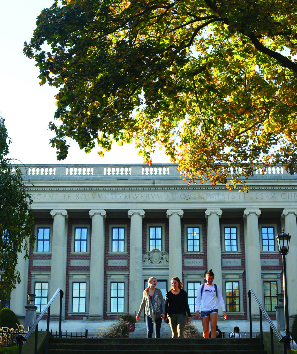 Students walking outside the library