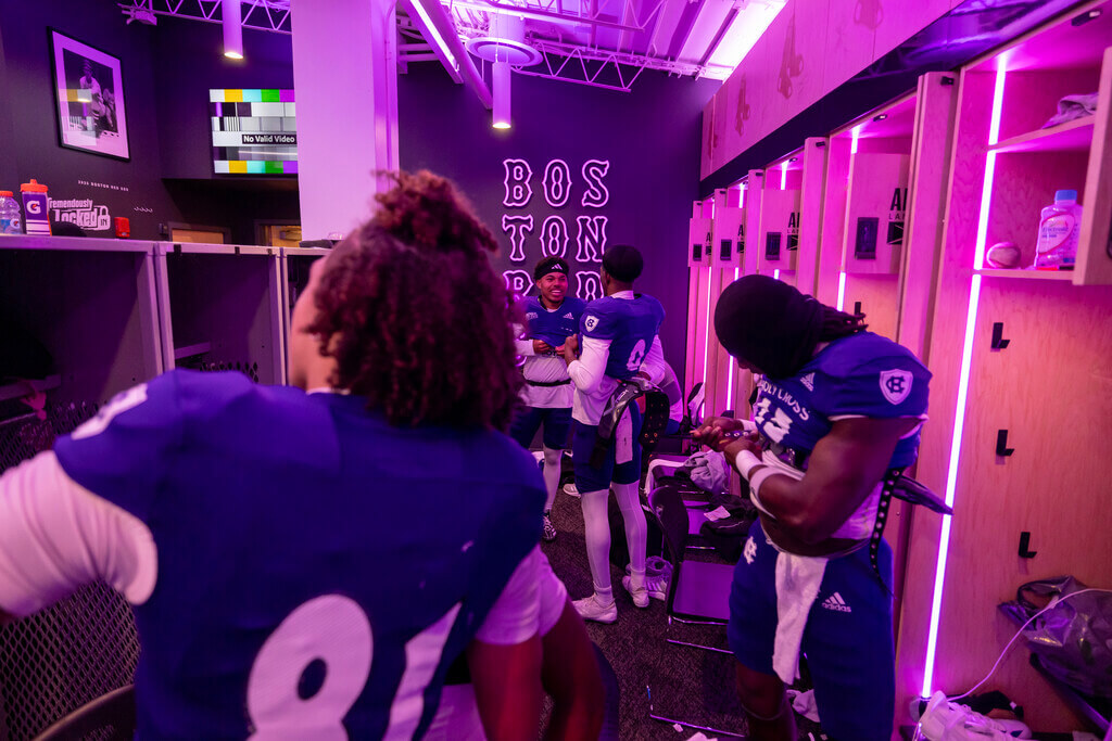 Holy Cross football players in Red Sox clubhouse