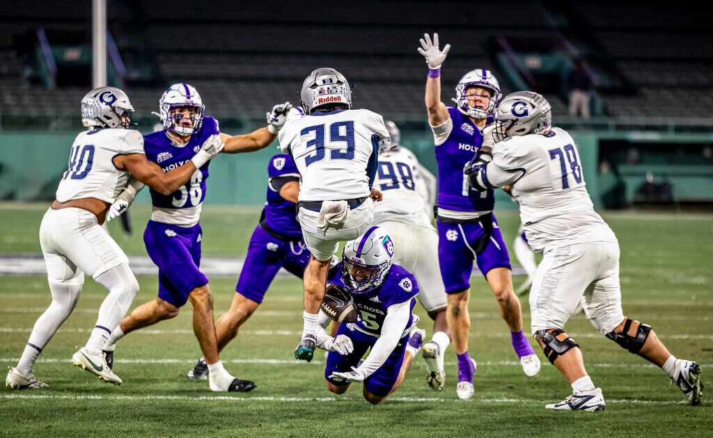 Football player blocks a punt