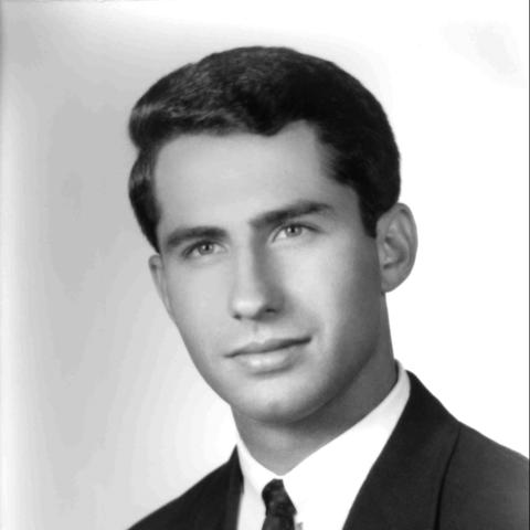 Yearbook photo of young Anthony Fauci in suit