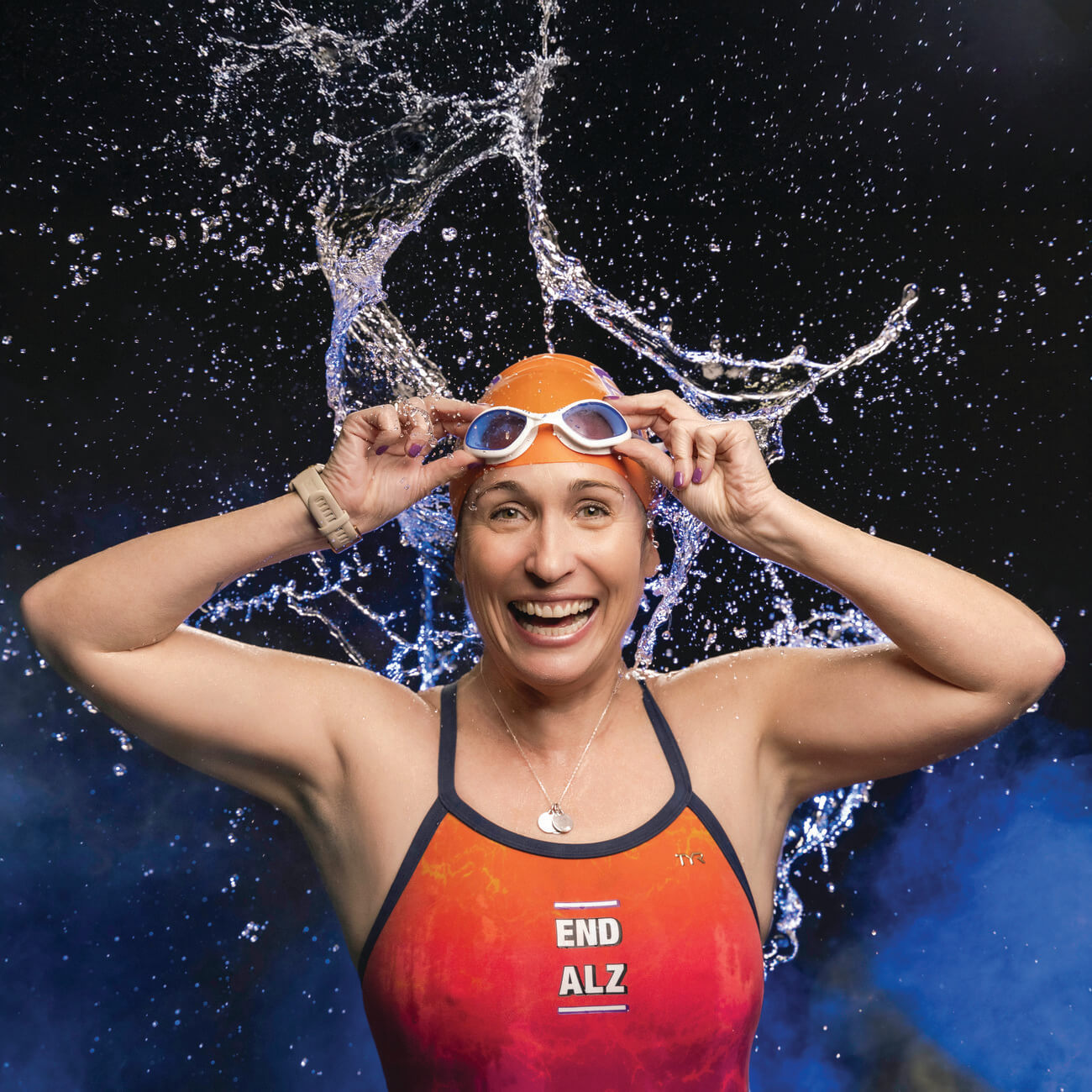 woman in swim cap and swimsuit