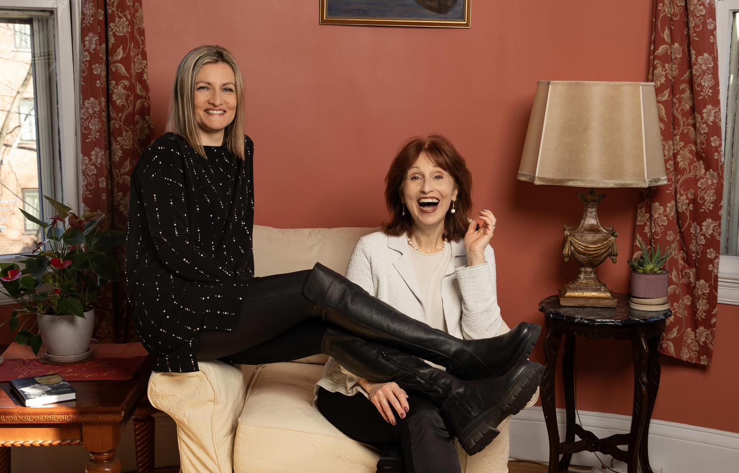 Two women sitting in a chair