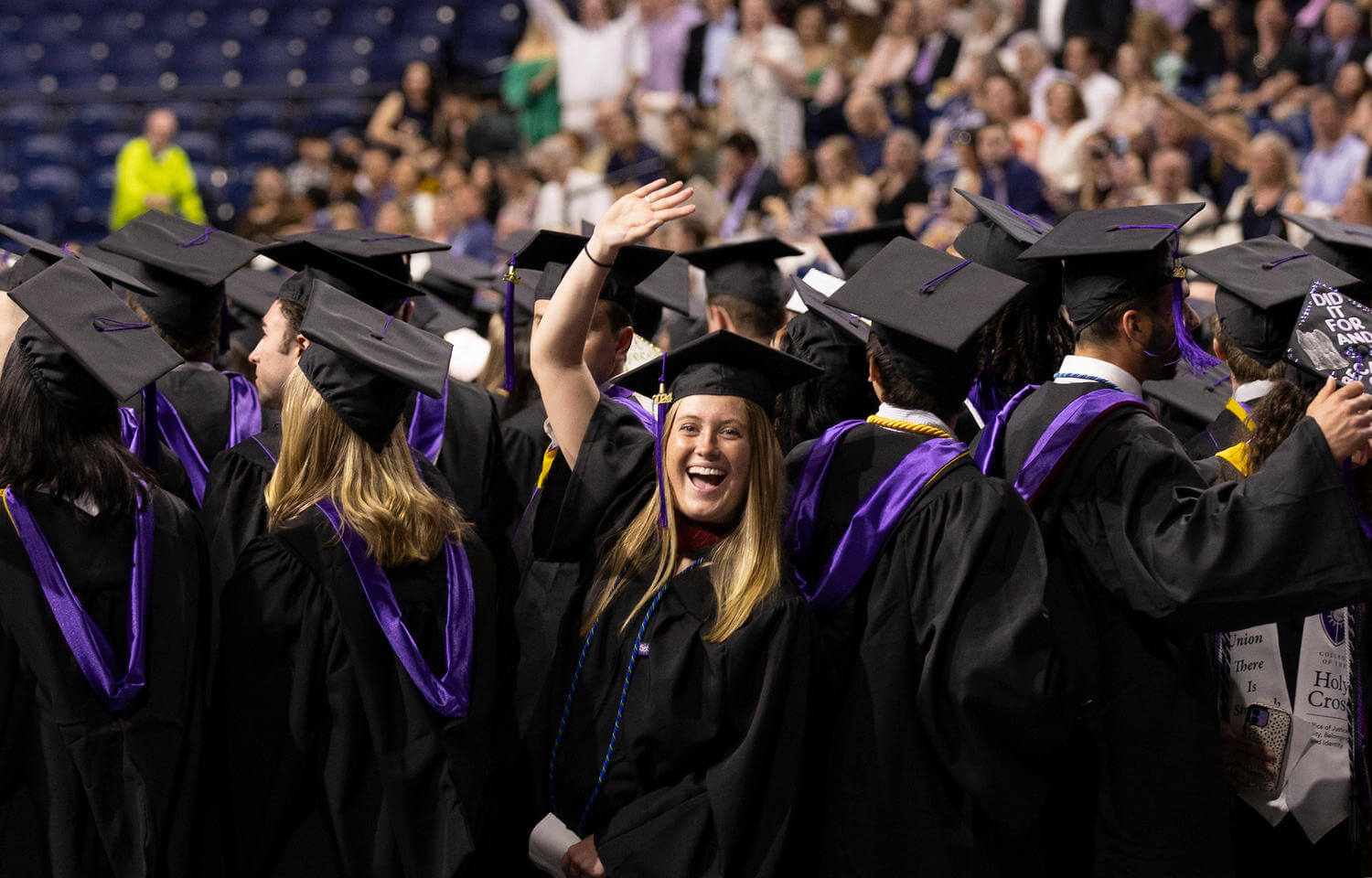 Woman student in cap and gown for a college graduation.