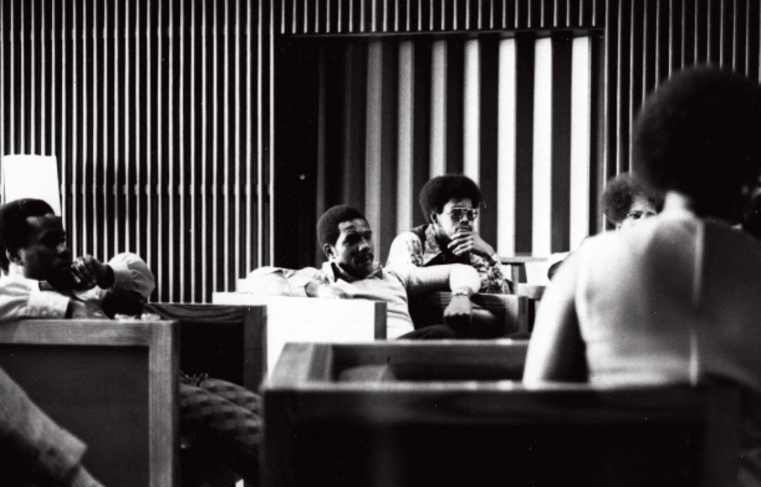 Members of the BSU circa 1970 sit together in chairs