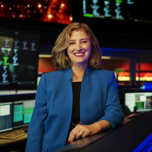 Headshot of woman in blue blazer