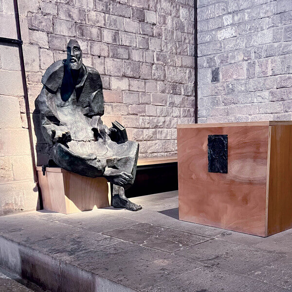 The modern statue “St. Ignatius begging for alms,” by sculptor Estanislau Feliu