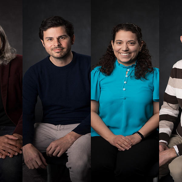 Four professors from Holy Cross