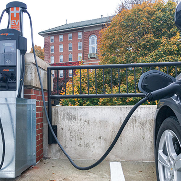 Electric vehicle charging station installed in the Holy Cross parking garage. Photo by John Cannon