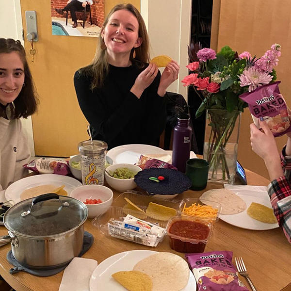 students showing off their meal kit. Photo by Meghan O'Keefe '21