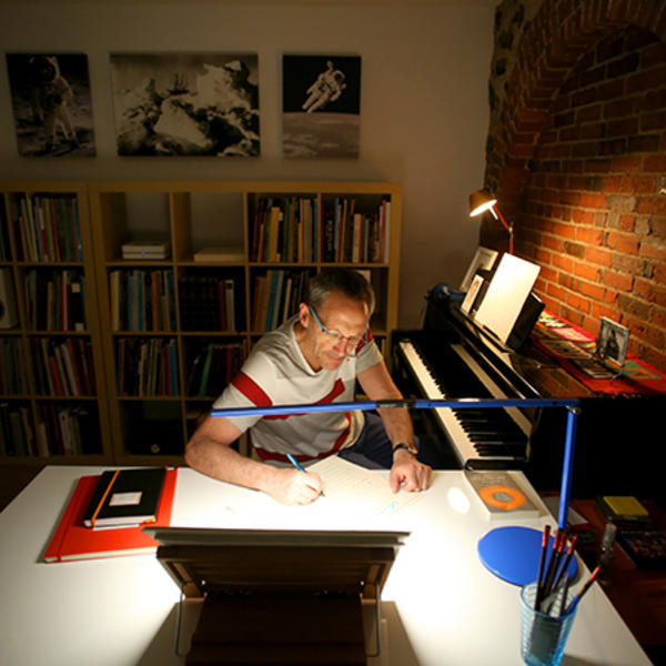 Osvaldo Golijov is pictured here working in his music studio. Photo by Tom Rettig