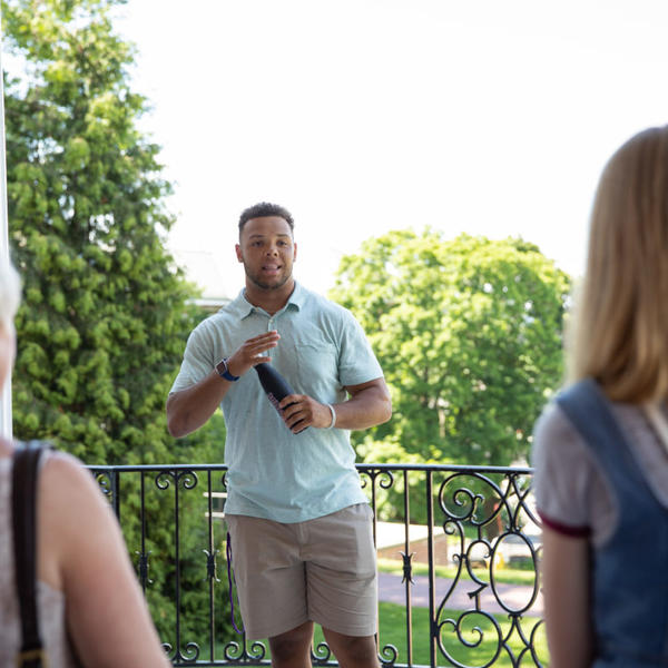 Matt Cedeno '22 leads an Admissions campus tour. Photo by Avanell Chang