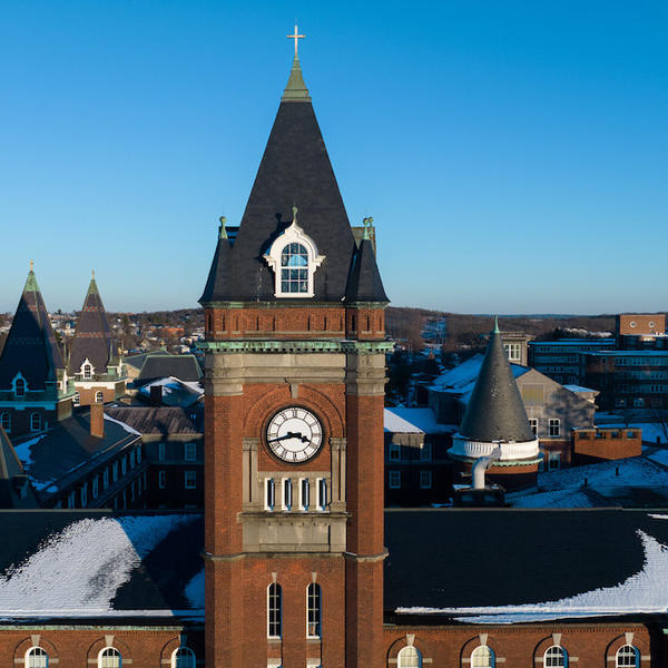 Aerial photo of the several brick buildngs topped with spires