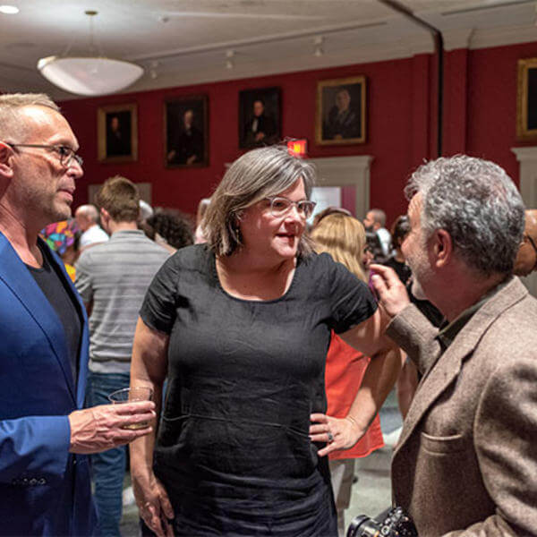 Stephanie Yuhl at the opening reception for "LGBTQ+ Worcester — For the Record," the exhibition she helped bring to life at the Worcester Historical Museum