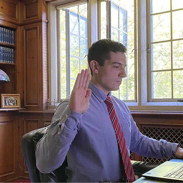Rudy Antoncic '22 is sworn in remotely as a U.S. Federal Government Pathways intern.