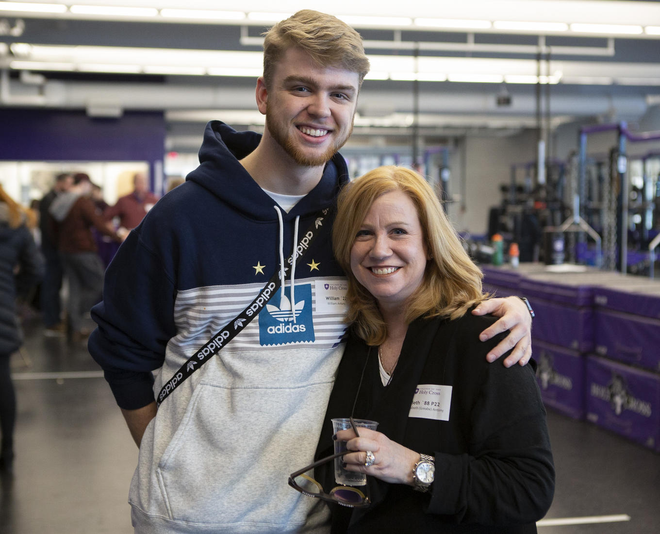 Beth Antony and her son at a Holy Cross event