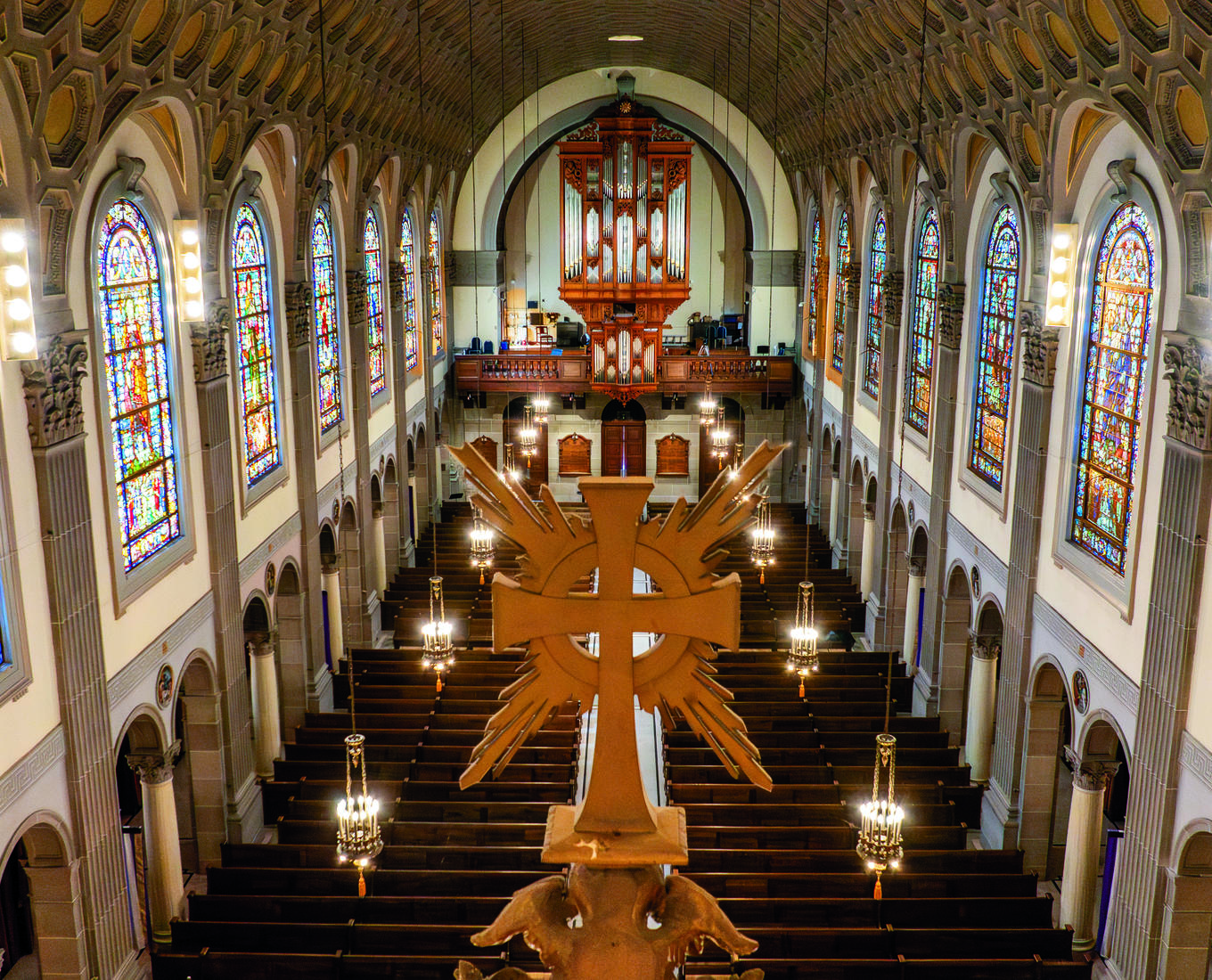 Photo of the inside of a church from a second floor.