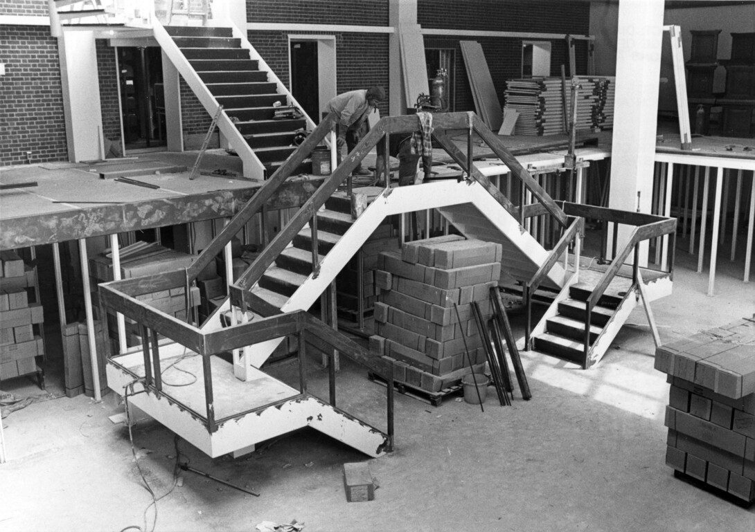 Black and white photo of the Hiatt wings under contstruction